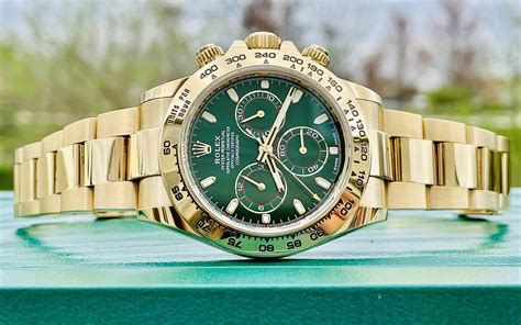 gold and green rolex daytona.